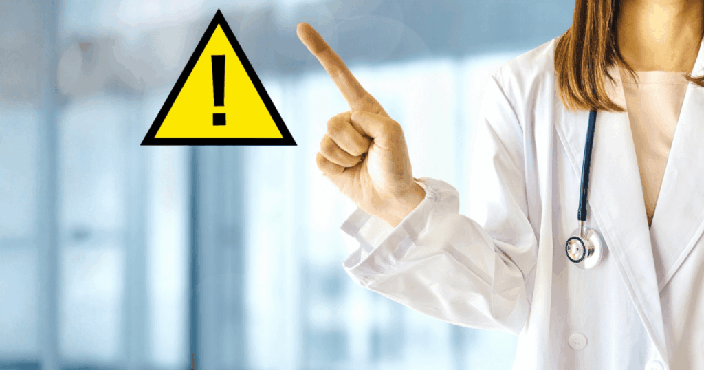 注意喚起を示す医師の指差しイメージ